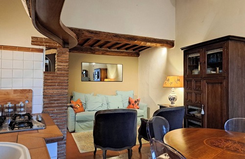 Lucca Historical Center Apartment | Exclusive retreat in the historic center of Lucca, overlooking Piazza Anfiteatro