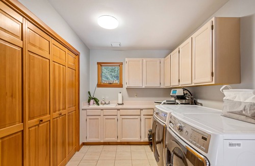 Clark Fork House | Expansive Riverfront Lodge with Dock, Game Room, Bar & Spacious Deck!