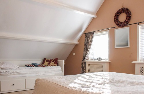 Tzummarum House | Experience a varied vacation in this comfortably furnished vacation home with private outdoor pool a
