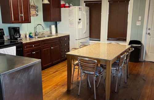 Golden Meadow House | Experience waterfront living at Wahoo in Grand Isle, LA, with boat access and cozy amenities.