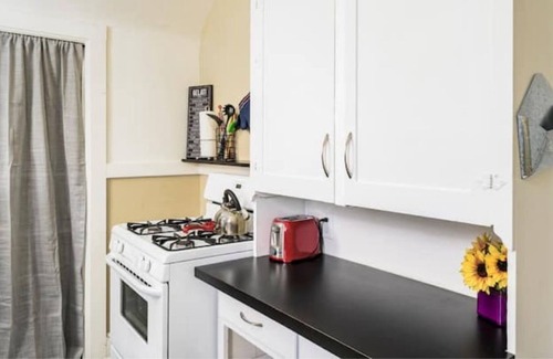 Speer Apartment | EXPLORE CO -Private upper unit and patio. Central.