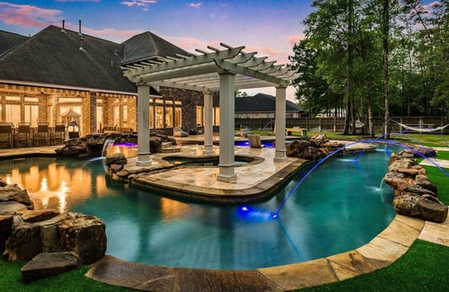 Spring House | Extended-stay paradise: lazy river, theater, poker, Peloton, mini golf and more.