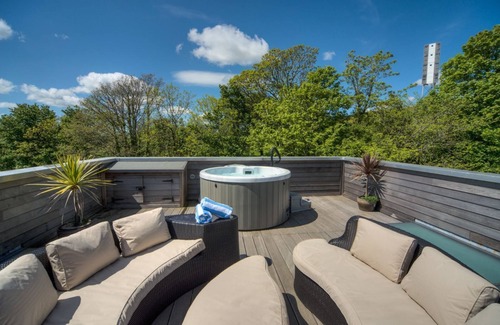 Talland House | Fabulous property with extensive roof terrace, reached by a spiral staircase, affords panoramic view