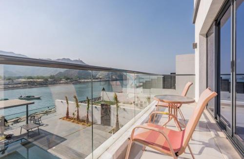 Sharm Apartment | Facing the Sea and Mountains 4BR Villa with Assistant Room and Private Pool, Al Dana Island, Fujairah by Deluxe Holiday Homes