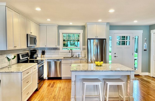 Suttons Bay Cottage | Fall openings w/late check out, Breathtaking waterfront, 2 SUP & 3 kayak & bikes