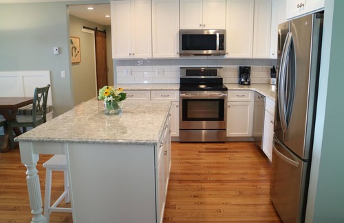 Suttons Bay Cottage | Fall openings w/late check out, Breathtaking waterfront, 2 SUP & 3 kayak & bikes