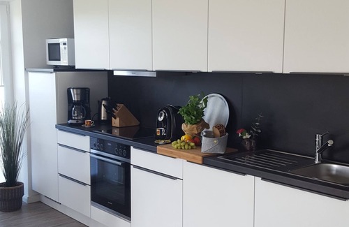 Greetsiel Apartment | Familienfreundliche Erdgeschosswohnung mit Großzügigem Garten und Wasserzugang