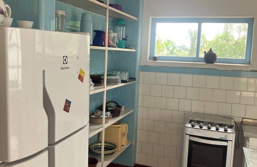 Santa Terezinha House | Family condominium facing the beach.