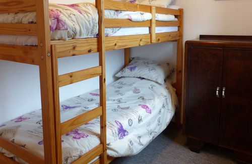 St Denis de Gastines Cottage | Family gîte with heated swimming pool.