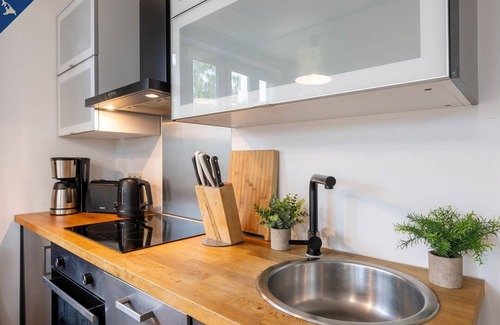 Quilitz House | Ferienhaus am Peenestrom - Beautiful vacation home with terrace and balcony on the