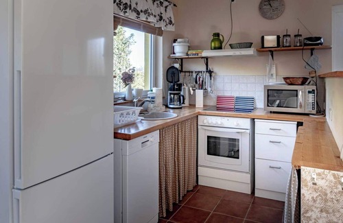 Neuendorf House | Ferienhaus Mandelhaus 2 mit Boddenblick - Natur & Entspannung in Saal