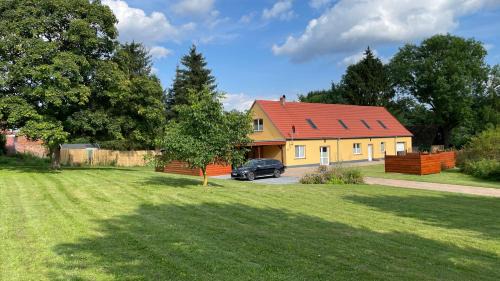 Blumenholz Apartment | Ferienhaus Weisdin