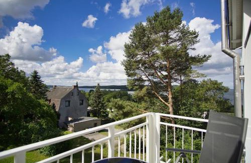 Lietzow Apartment | Ferienwohnung mit Balkon und Meerblick - Ferienresidenz Zwei Bodden FeWo 1-4