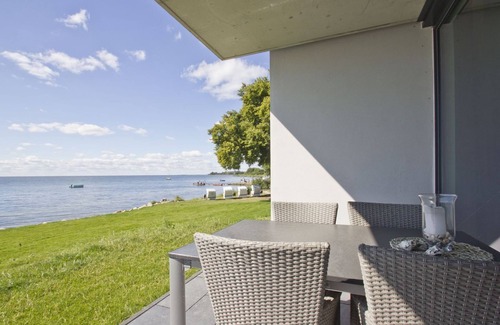 Middelhagen Apartment | FeWo Heimathafen - modern vacation apartment near the water with sea view -