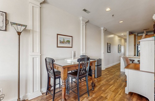 Folly Beach Condo | First-floor villa w/partial ocean views, covered porch -one block from the beach