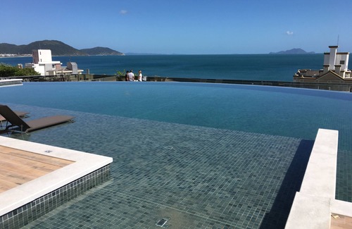 Ingleses Sul Apartment | Fit new design - play area with infinity pool and spectacular view