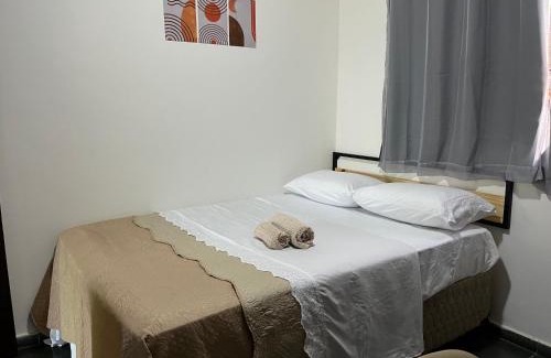 Jardim Ipe Apartment | Flat com ar e varanda com linda vista para o Ibituruna - Vôo Livre 203