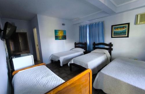 Conservatoria Apartment | Flat e suítes com deque, cozinha e churrasqueira