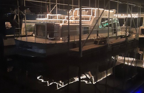 Graford Boat Rental | Floating Lakefront Apartment- Relax on vintage houseboat on Possum Kingdom Lake!