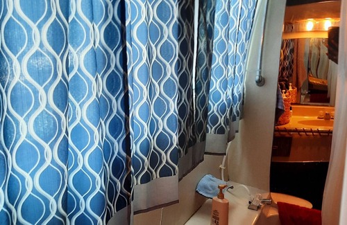 Graford Boat Rental | Floating Lakefront Apartment- Relax on vintage houseboat on Possum Kingdom Lake!