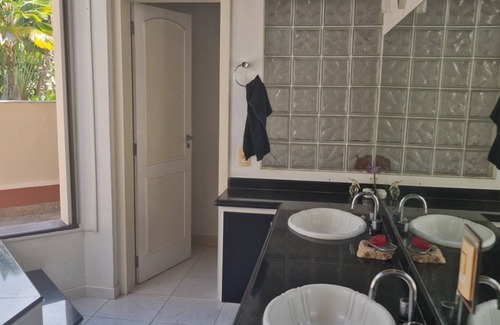 Guaiu House | Flower house on the edge of Guaiú beach in a high-standard condominium.