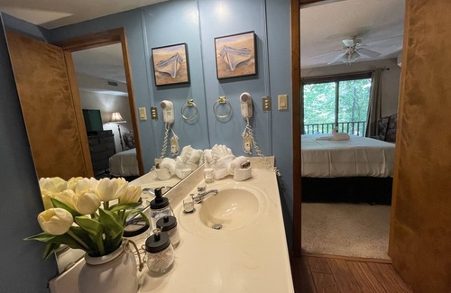 Mount Ida Condo | Forest Retreat Condo, lower level, close to Spa, pool, and lake. We want you!