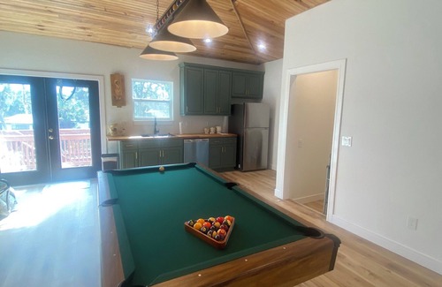 Astor House | Forget your worries in this serene space. New 4-bedroom 4 bath house in Astor