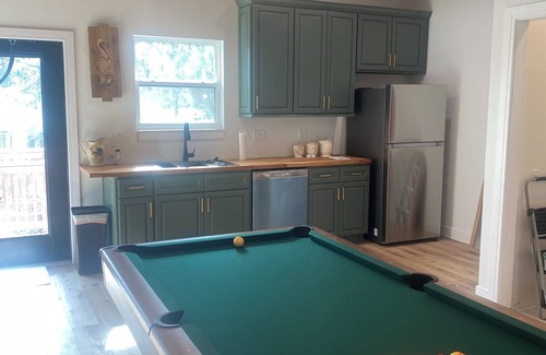 Astor House | Forget your worries in this serene space. New 4-bedroom 4 bath house in Astor