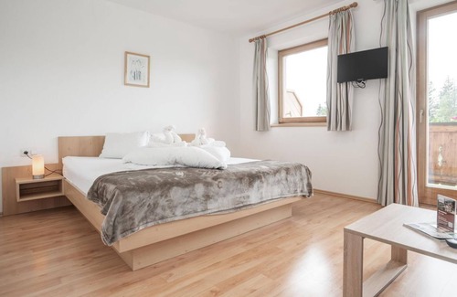 Scheffau am Wilden Kaiser Bed & Breakfast | Four-bed room 11 shower/WC, from 4 nights half board - Berggasthof Bärnstatt