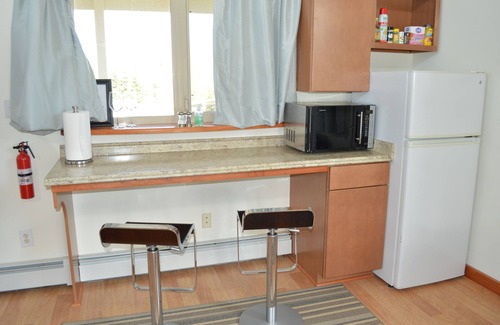 Kenai House | Free Alaskan treats and breakfast items in equipped kitchenette with DW/MW/F