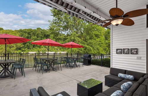 Asheville House | French Broad River Lodge - Modern Amenities and Riverfront Views in Every Room!