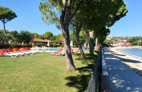 Monte House | Front Lake Resort Le Corti del Lago by Interhome