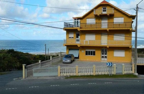 Larino Apartment | Front line beach apartment in Lariño