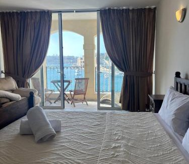 Kalkara House | Front Row Seafront House with Dreamy Valletta and Harbour Sunset Views