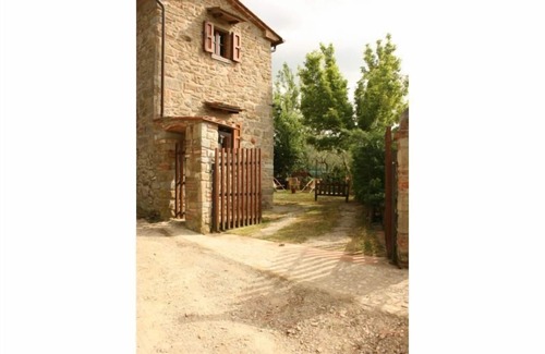 Montecchio Villa | Fully detached and fenced stone cottage with an outside porch. Garden equipped with table, chairs, d