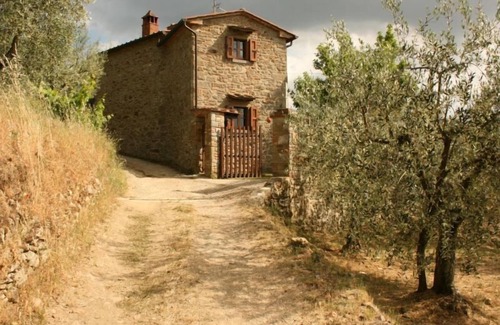 Montecchio Villa | Fully detached and fenced stone cottage with an outside porch. Garden equipped with table, chairs, d