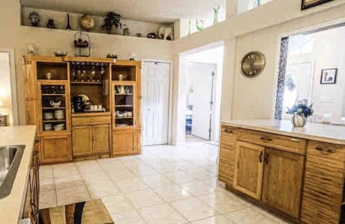 Port Saint John House | Fun for families, lots of room, private backyard oasis with heated pool.