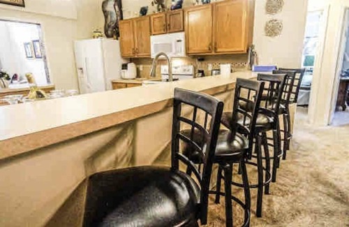 Port Saint John House | Fun for families, lots of room, private backyard oasis with heated pool.