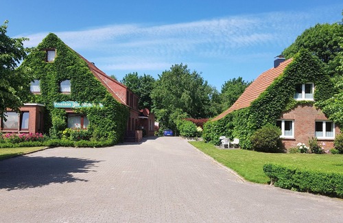 Dornumergrode Apartment | Gästehaus Zur alten Post - Wohnung West