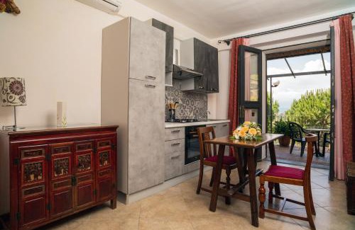 Castelmola Apartment | Garden Cottage I Dammusi - Arancio