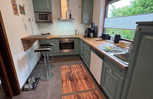 Wiesbaum Apartment | Garden Suite with Sauna, 2 fireplaces, covered terrace & pizza oven