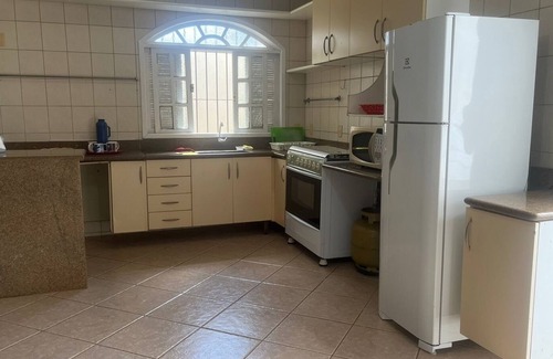 Bairro Novo House | Gaspar Duplex House "foot in the sand"