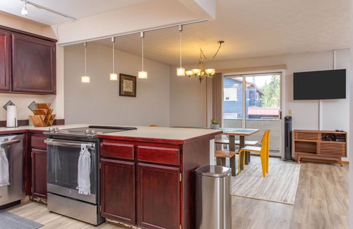 Alyeska Condo | Girdwood condo w/wood-burning fireplace & balcony w/mtn views - walk to lifts