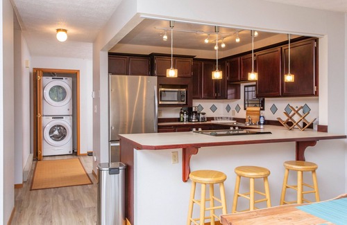 Alyeska Condo | Girdwood condo w/wood-burning fireplace & balcony w/mtn views - walk to lifts