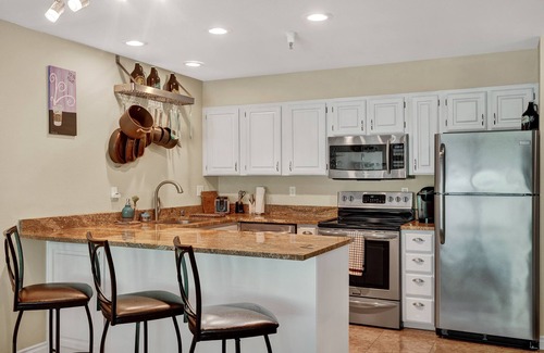 Alyeska Condo | Girdwood Slopeside Condo with Roof Top Patio!