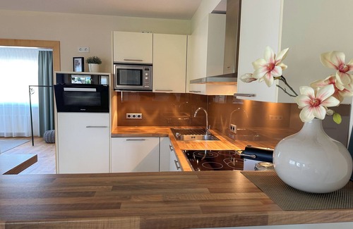 Seekirchen am Wallersee Apartment | GLÜCKSMOMENT" maisonette apartment: Harmonious refuge for creative time out