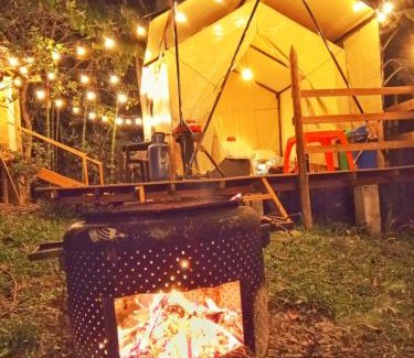 Jardin Other | Glamping Colibrí, bosque vecino y vista a la montaña al mismo tiempo