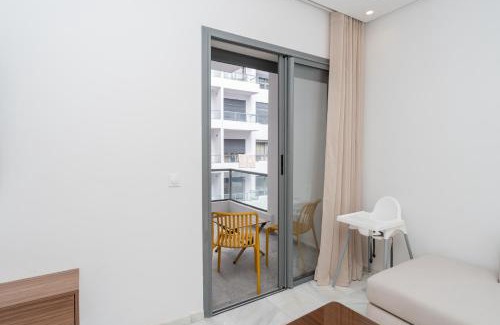 Tangier Apartment | Glorious Garden, Appartement Familial, Face au Stade Ibn Batouta, Espaces Verts, Proche Aéroport, Parking, WIFI, AC, IPTV