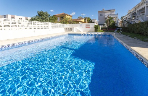 Playa de Gandia House | GOLDEN - Chalet with shared pool in Playa de Gandia. Free WiFi