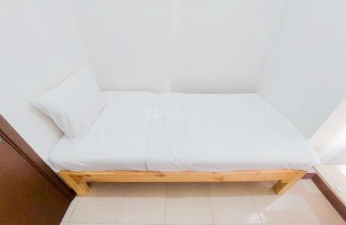 South Tangerang Apartment | Good Price and Homey 2BR at Loftvilles City Apartment By Travelio